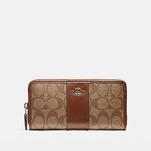COACH ACCORDION ZIP WALLET IN SIGNATURE COATED CANVAS WITH LEATHER STRIPE F54630